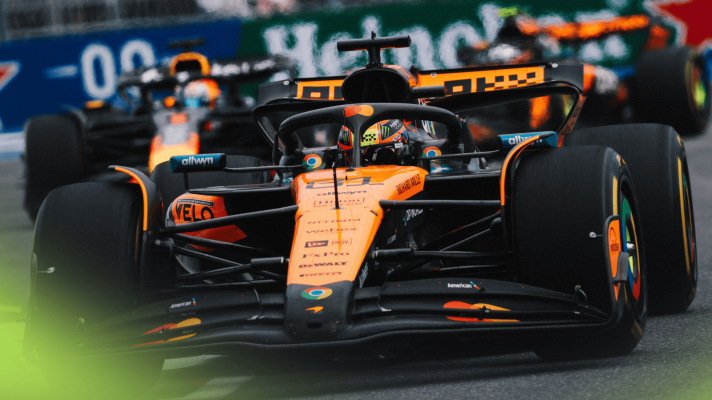 An action shot of Oscar Piastri leading Max Verstappen and Lando Norris on track in Miami