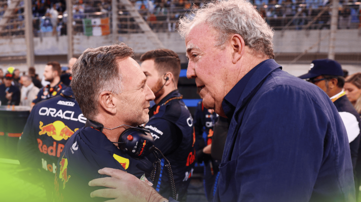 Jeremy Clarkson places his hand on Christian Horner's shoulder during a conversation on the grid in Bahrain