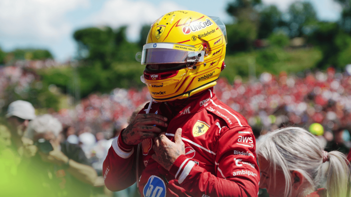 Lewis Hamilton wearing his helmet on the grid at Imola