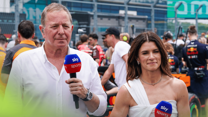 Martin Brundle stands alongside Danica Patrick during a Sky F1 broadcast at the Miami GP