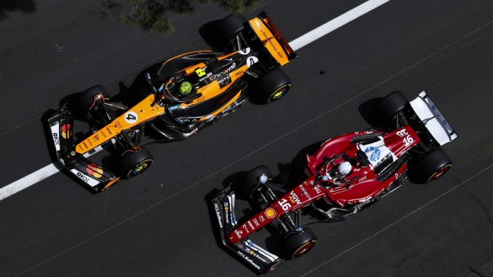 Seen from overhead, Lando Norris and Charles Leclerc race side-by-side during the Monaco GP.