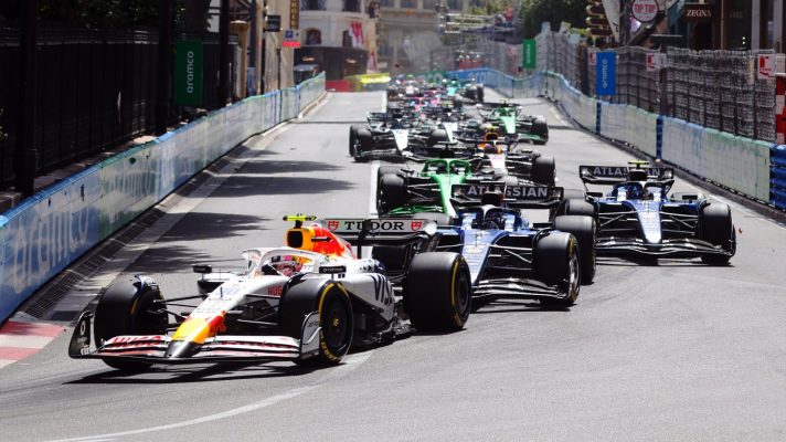 A pack of cars finds itself stuck behind Liam Lawson as he enters Mirabeau during the Monaco Grand Prix.