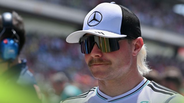 Valtteri Bottas in a Mercedes cap on the grid ahead of the Spanish Grand Prix.