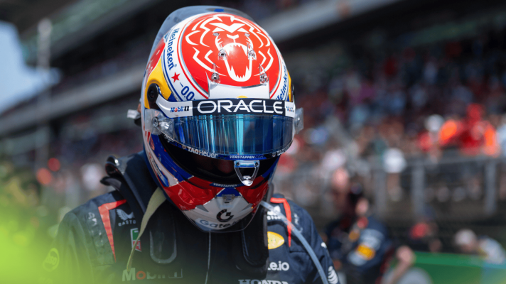 Max Verstappen lowers his head with the visor of his helmet open on the Spanish GP grid