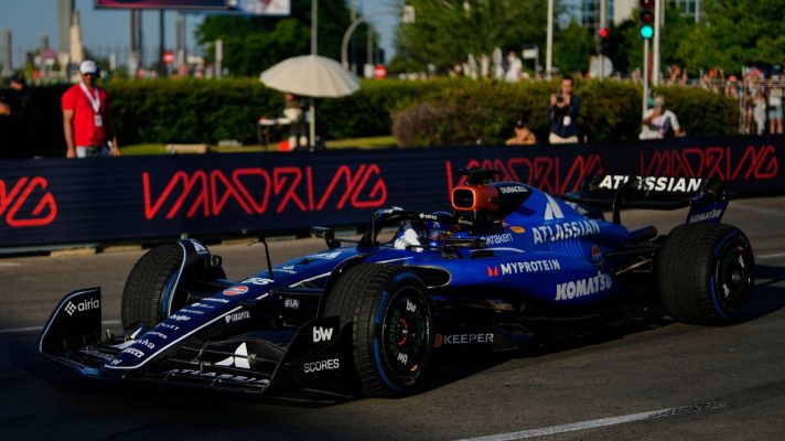 Carlos Sainz of Spain steers his car during a demonstration on a section of the future Formula 1 street circuit in Madrid.
