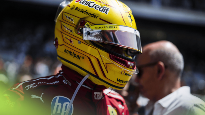 Lewis Hamilton wearing his helmet on the grid in Barcelona