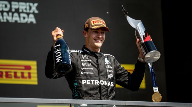 George Russell on the podium after winning the Canadian Grand Prix.