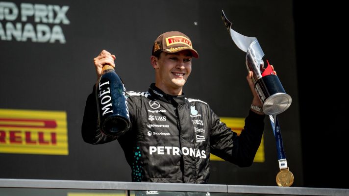 George Russell on the podium after winning the Canadian Grand Prix.