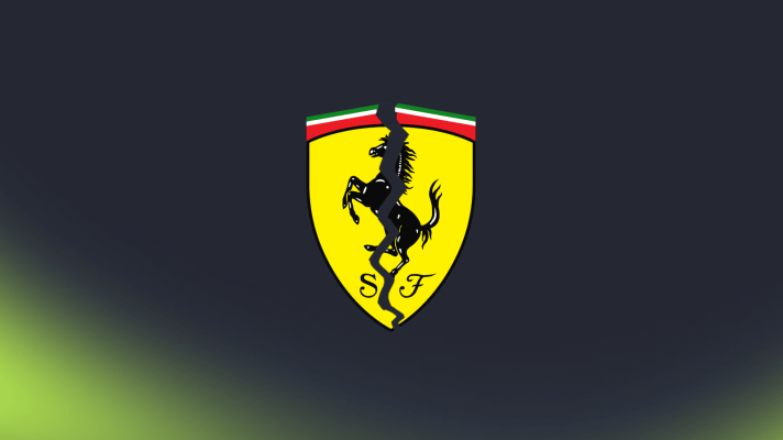 A Ferrari logo with a large crack running through the middle against a dark background