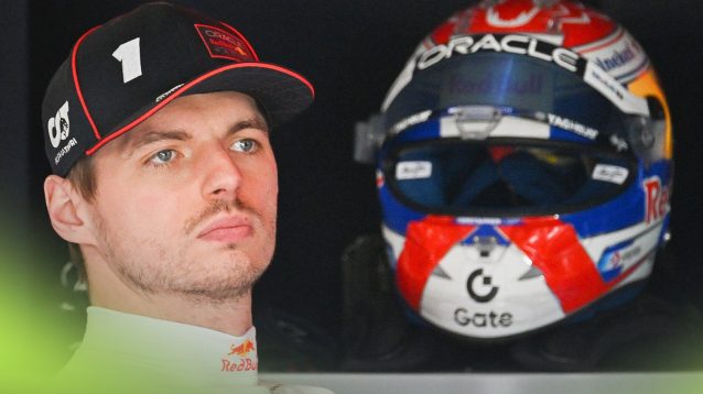 Max Verstappen pictured in the Red Bull garage at the 2025 Canadian Grand Prix, with his helmet visible in the background