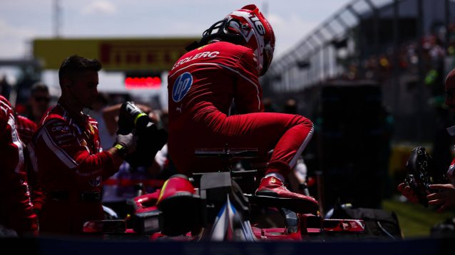 Charles Leclerc and his Ferrari on the grid