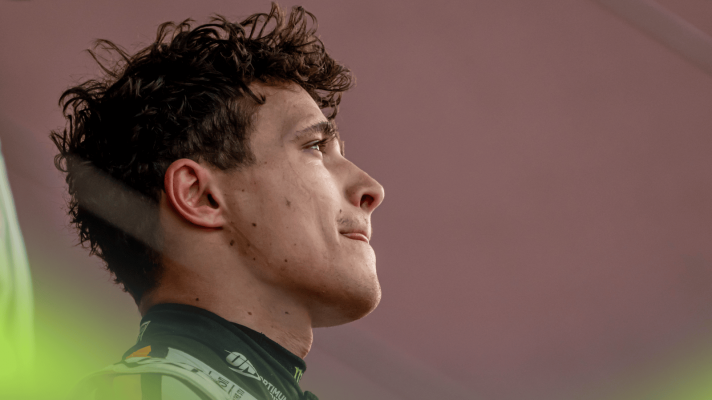 A side-profile shot of Lando Norris during the podium at the 2025 Monaco Grand Prix