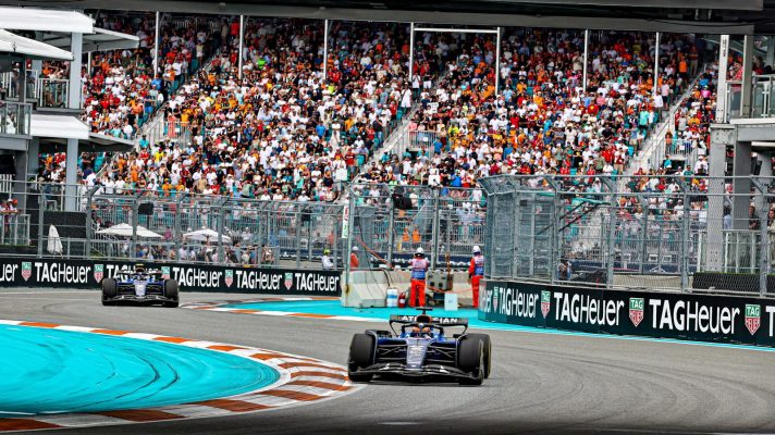 Alex Albon on track in front of a packed grandstand during the Miami Grand Prix.