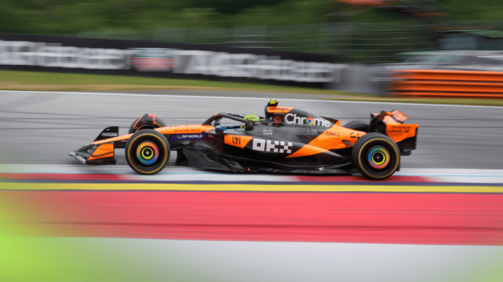 An action shot of Lando Norris's McLaren on track in Austria
