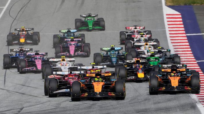 McLarens driver Lando Norris and Oscar Piastri of Australia lead at the start during the Austrian Formula One Grand Prix