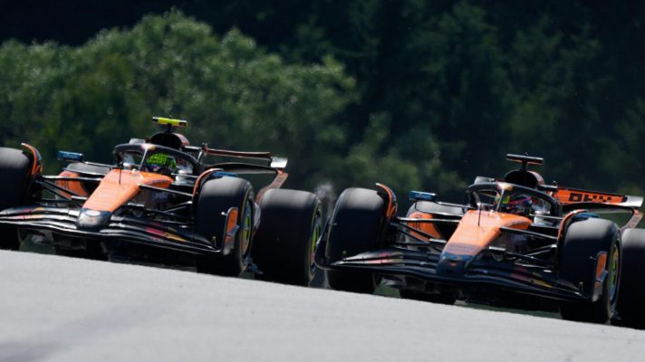 Lando Norris side to side with Oscar Piastri during the F1 Austrian Grand Prix.