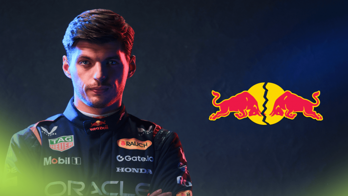 A moody shot of Max Verstappen with his arms crossed and a cracked Red Bull logo alongside him