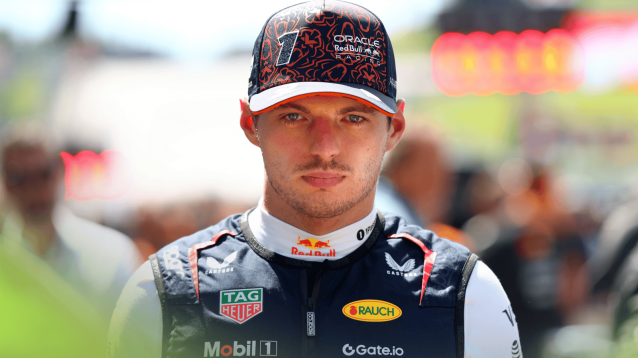 Max Verstappen eyes the camera on the grid in Austria