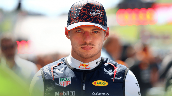 Max Verstappen eyes the camera on the grid in Austria
