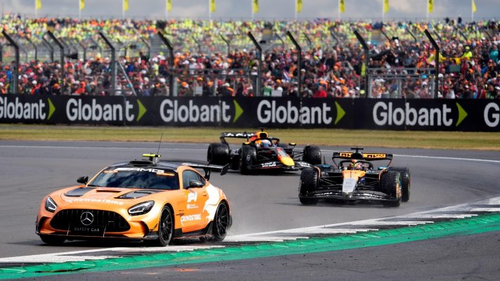 Oscar Piastri trailing the safety car.