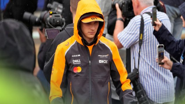 Oscar Piastri, McLaren, with the hood up on his rain jacket at the 2025 British Grand Prix