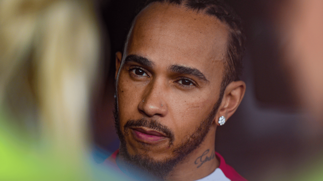 Lewis Hamilton faces the media