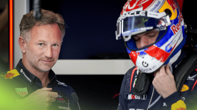 Christian Horner eyes the camera as Max Verstappen puts on his helmet in the Red Bull garage