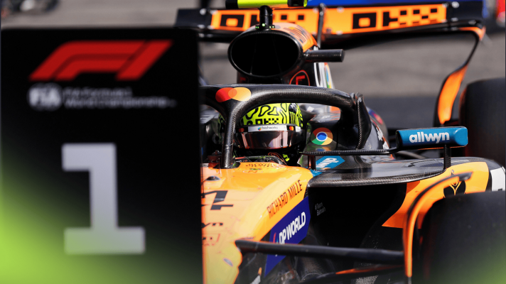 Lando Norris pulls up in front of the number 1 board in parc ferme at Spa