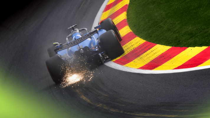 A rear-facing shot of Alex Albon's Williams kicking up a shower of sparks as he negotiates Eau Rouge at Spa