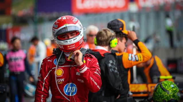 Charles Leclerc walks away from race winner Lando Norris
