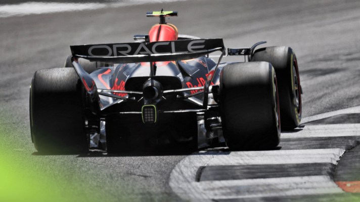 A rear-facing shot of Arvid Lindblad's Red Bull RB21 on track in FP1 at Silverstone