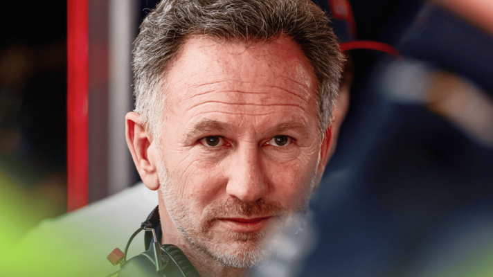 Christian Horner appears tired as he looks on in the Red Bull garage