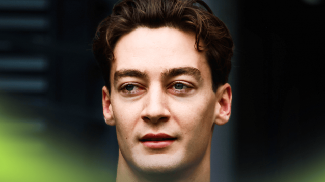 George Russell looks on in the paddock in Hungary