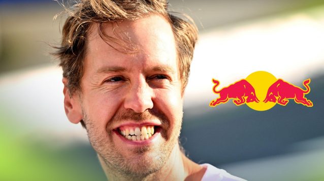 A smiling Sebastian Vettel, as a Red Bull logo appears to his right