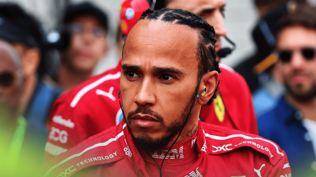 Lewis Hamilton looks concerns on the grid in China