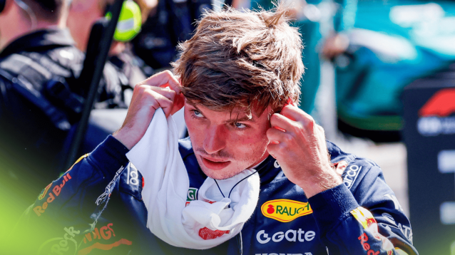 Max Verstappen removes his earplugs in parc ferme after qualifying at Zandvoort
