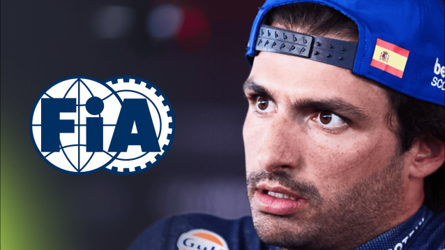 A close-up shot of Carlos Sainz looking annoyed with a prominent FIA logo alongside him