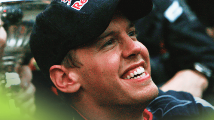 Sebastian Vettel smiles widely during Red Bull's celebrations at the 2009 Chinese Grand Prix