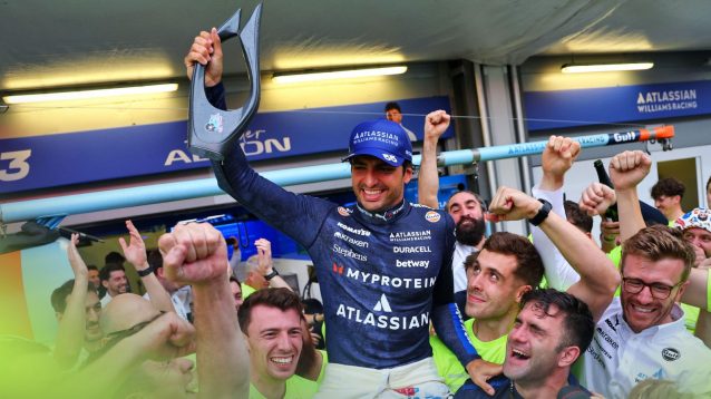 Carlos Sainz, holding his P3 trophy, lifted up by the Williams crew at the 2025 Azerbaijan Grand Prix