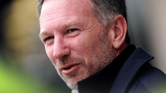 A close-up shot of Christian Horner mid-conversation while wearing plain clothes