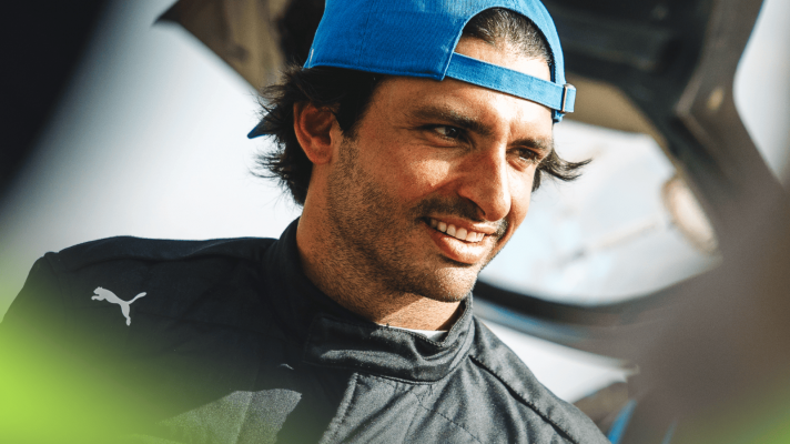 Carlos Sainz smiles during his rally test with Ford