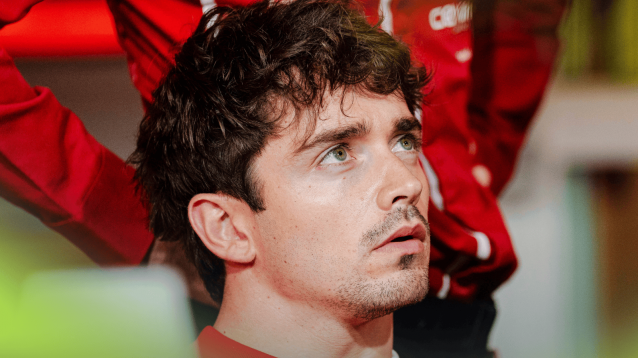 Charles Leclerc looks alarmed in the F1 paddock in Singapore