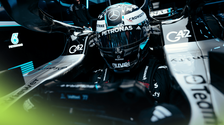 Valtteri Bottas sat in the cockpit of the Mercedes W13 with the steering wheel in front of him