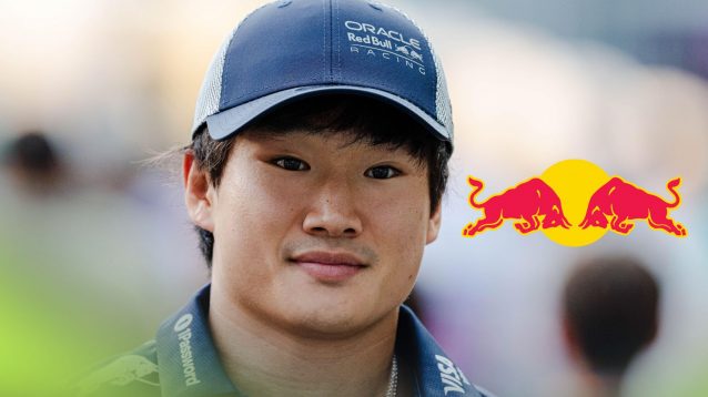 Red Bull driver Yuki Tsunoda pictured at the 2025 Singapore Grand Prix, as a Red Bull logo appears on his right