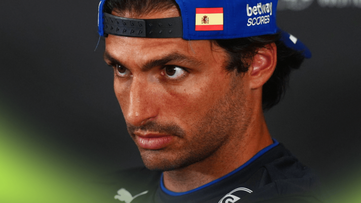 Carlos Sainz looks on in a press conference