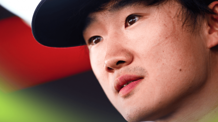 A close-up shot of Yuki Tsunoda taken from underneath