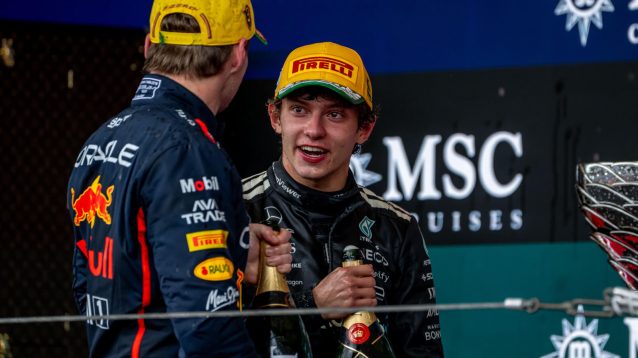 Kimi Antonelli on the podium with Max Verstappen