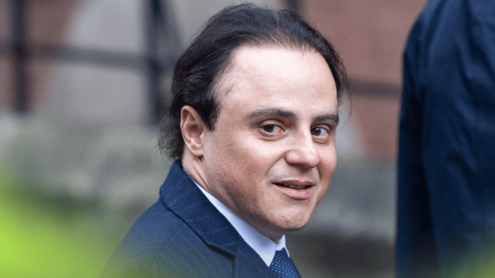 Felipe Massa eyes the camera as he attends his hearing at the Royal Courts of Justice in London