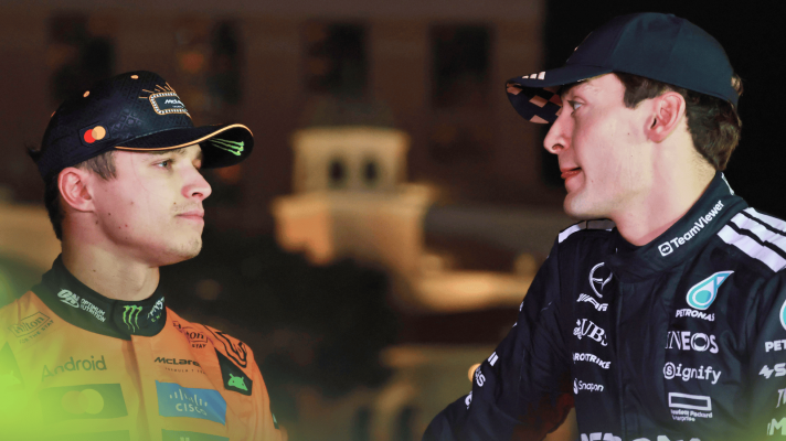Lando Norris and George Russell in conversation during the podium ceremony in Las Vegas