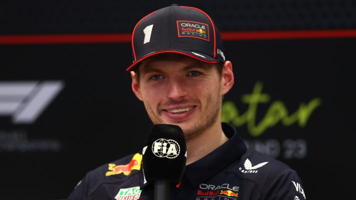 Max Verstappen with a microphone in Qatar.